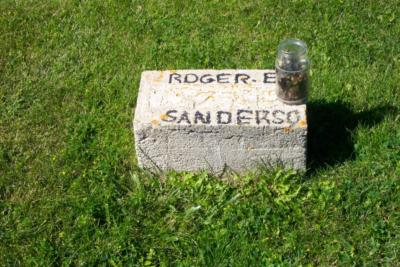 Sanderson, Roger E.